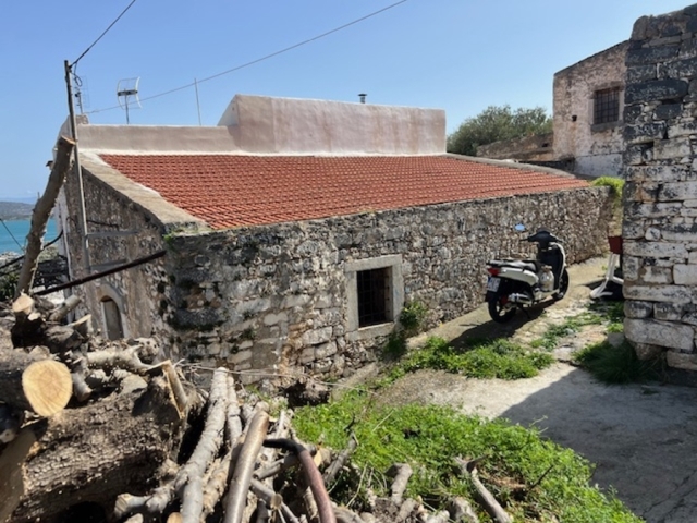 Old stone semi detached house for sale in Elounda 