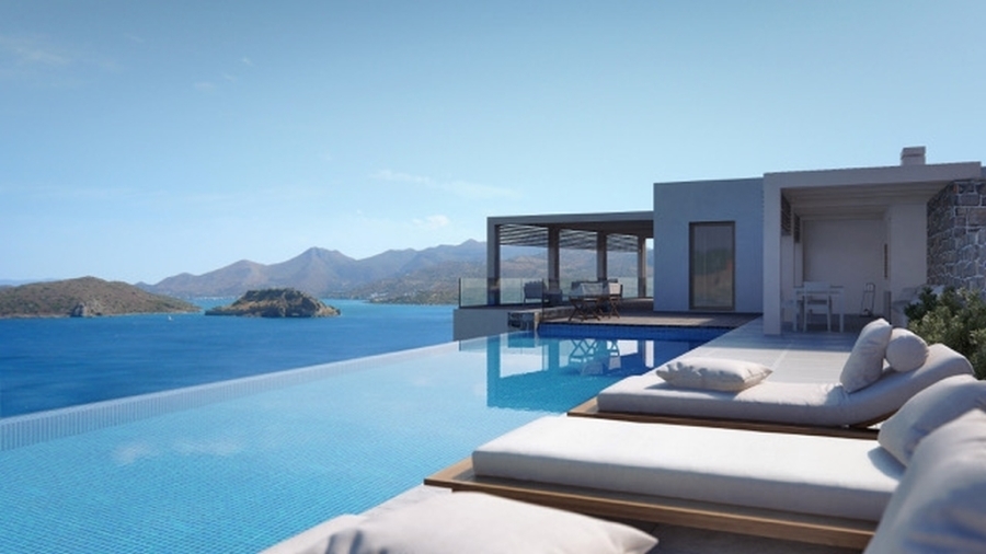 A stunning unfinished seaside villa for sale in Plaka, Elounda 