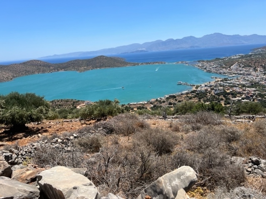 Two adjacent land plots for sale with panoramic view of Elounda Bay 